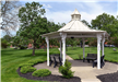 An outside view of town hall grounds and white gazebo